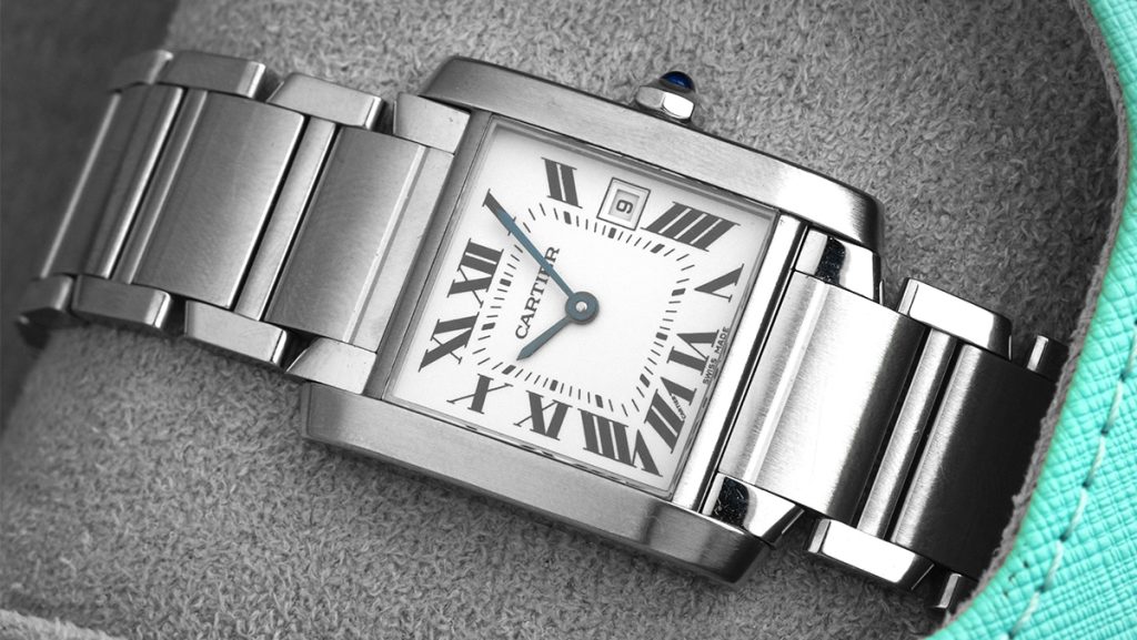 Kleine, silberne Dresswatch von Cartier mit eckigem Zifferblatt
