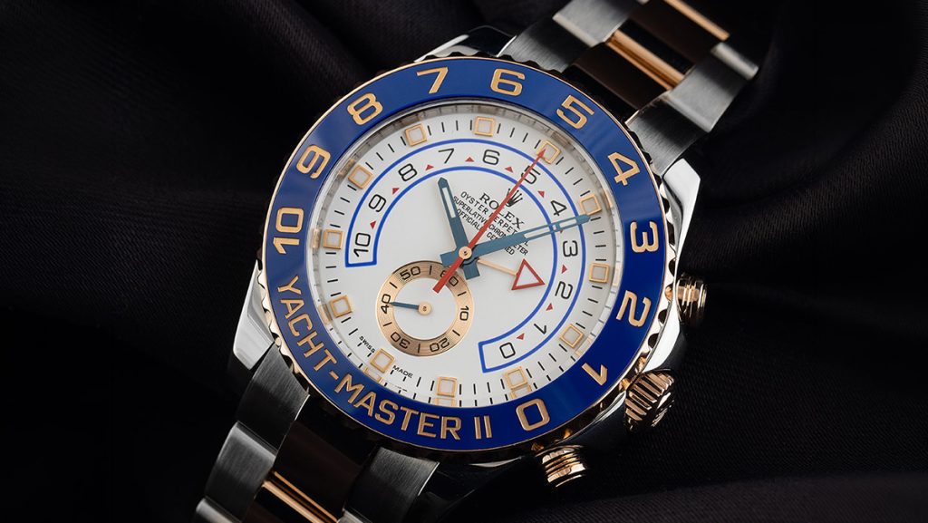 Rolex Yacht-Master II mit blauen und goldenen Akzenten auf Zifferblatt und Lünette