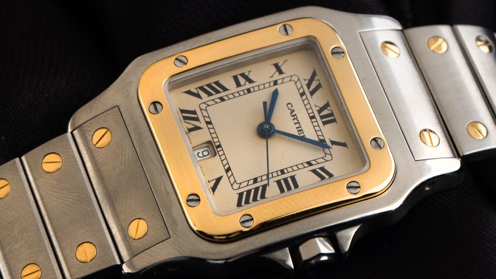 Cartier Santos mit großem, eckigen Zifferblatt in gold-silber