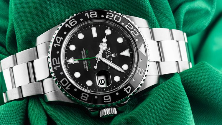 Rolex GMT Master II mit schwarzem Zifferblatt und grünen Akzenten
