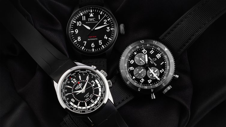 Drei gut ablesbare GMT-Uhren, alle in schwarz-silber
