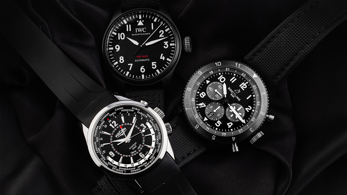 Drei gut ablesbare GMT-Uhren, alle in schwarz-silber