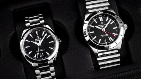 Zwei klassische Business Uhren aus Edelstahl von Omega und Breitling