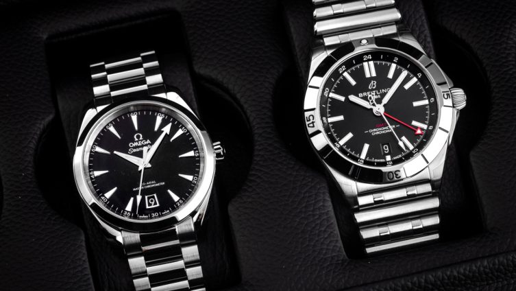 Zwei klassische Business Uhren aus Edelstahl von Omega und Breitling