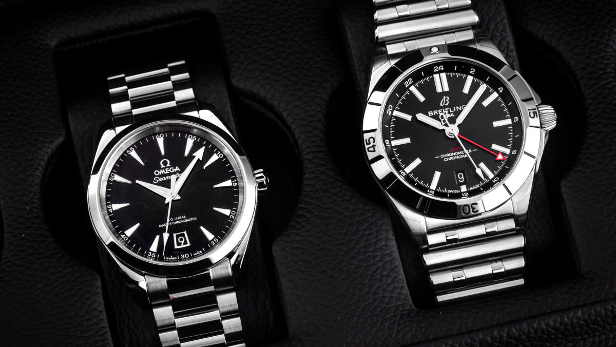 Zwei klassische Business Uhren aus Edelstahl von Omega und Breitling