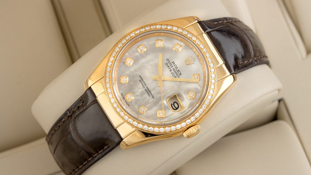 Edle Rolex Datejust diamantbesetzt und vergoldet, mit schwarzem Lederarmband