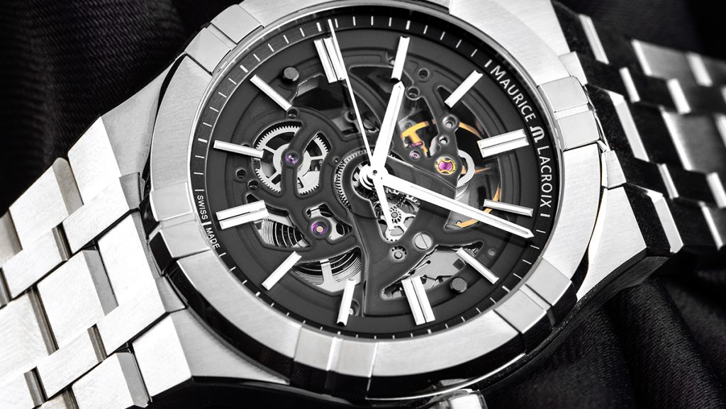 Skeleton Uhr in Edelstahl mit schwarzem Zifferblatt