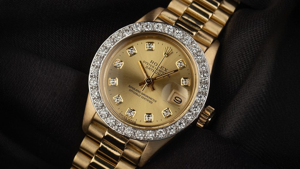 Goldene Rolex Datejust Lady mit Diamanten-Lünette