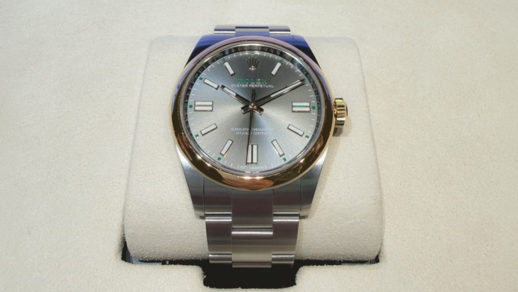 Rolex Oyster Perpetual 41 mit goldenem Lünettenring