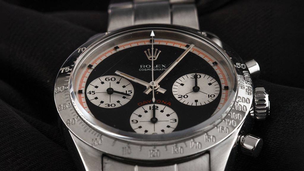 Gravierte Lünette und Totalisatoren der Daytona Paul Newman im Detail