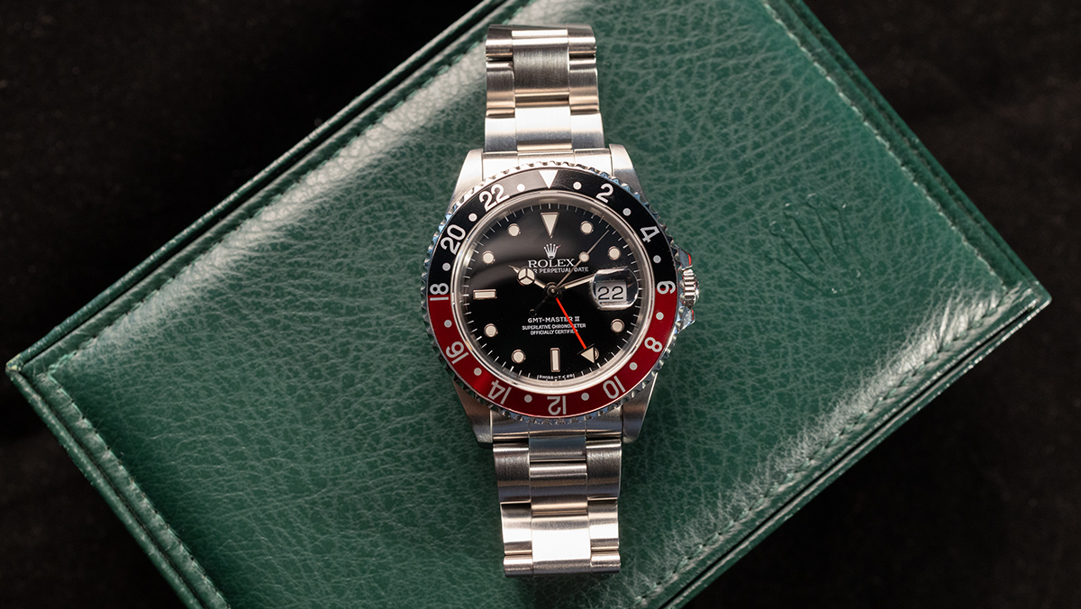 Beliebte Luxusuhr Rolex Coke mit schwarz-roter Lünette