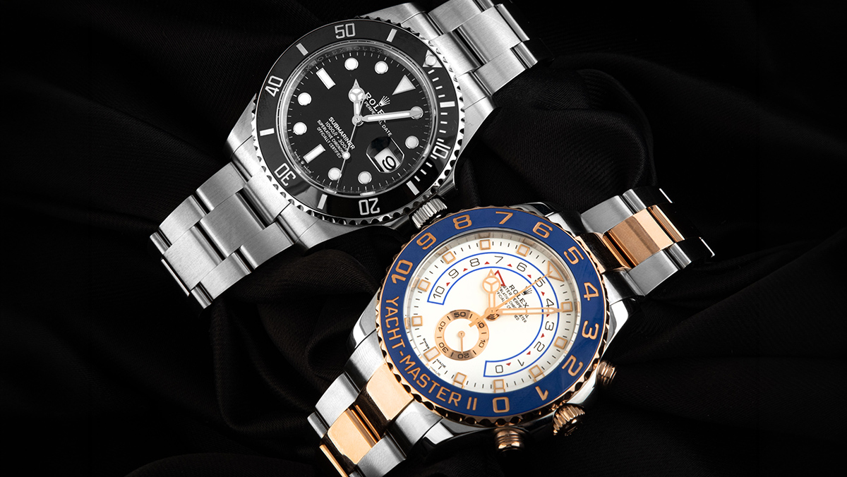 Klassische Rolex Submariner und komplizierte Yacht-Master nebeneinander