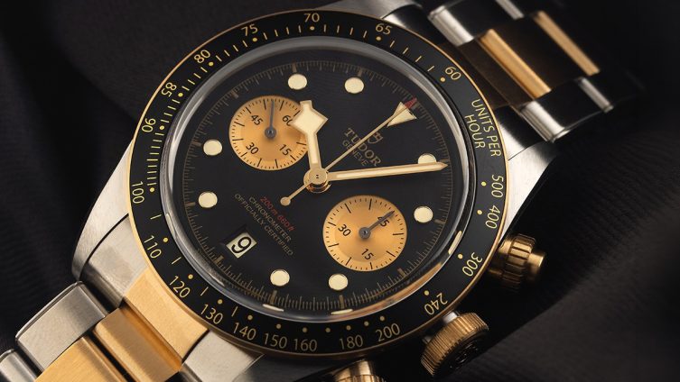 Tudor Chronograph mit schwarzem Zifferblatt und goldenen Akzenten