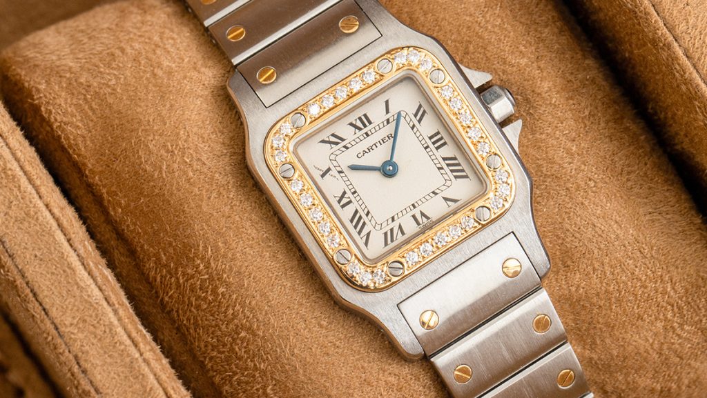 Cartier Santos in Bicolor mit Diamanten und creme Zifferblatt