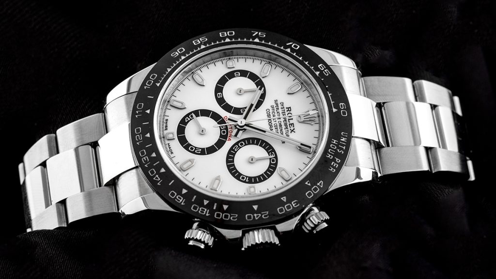 Rolex Uhr mit weißem Zifferblatt mit schwarzen Kontrasten